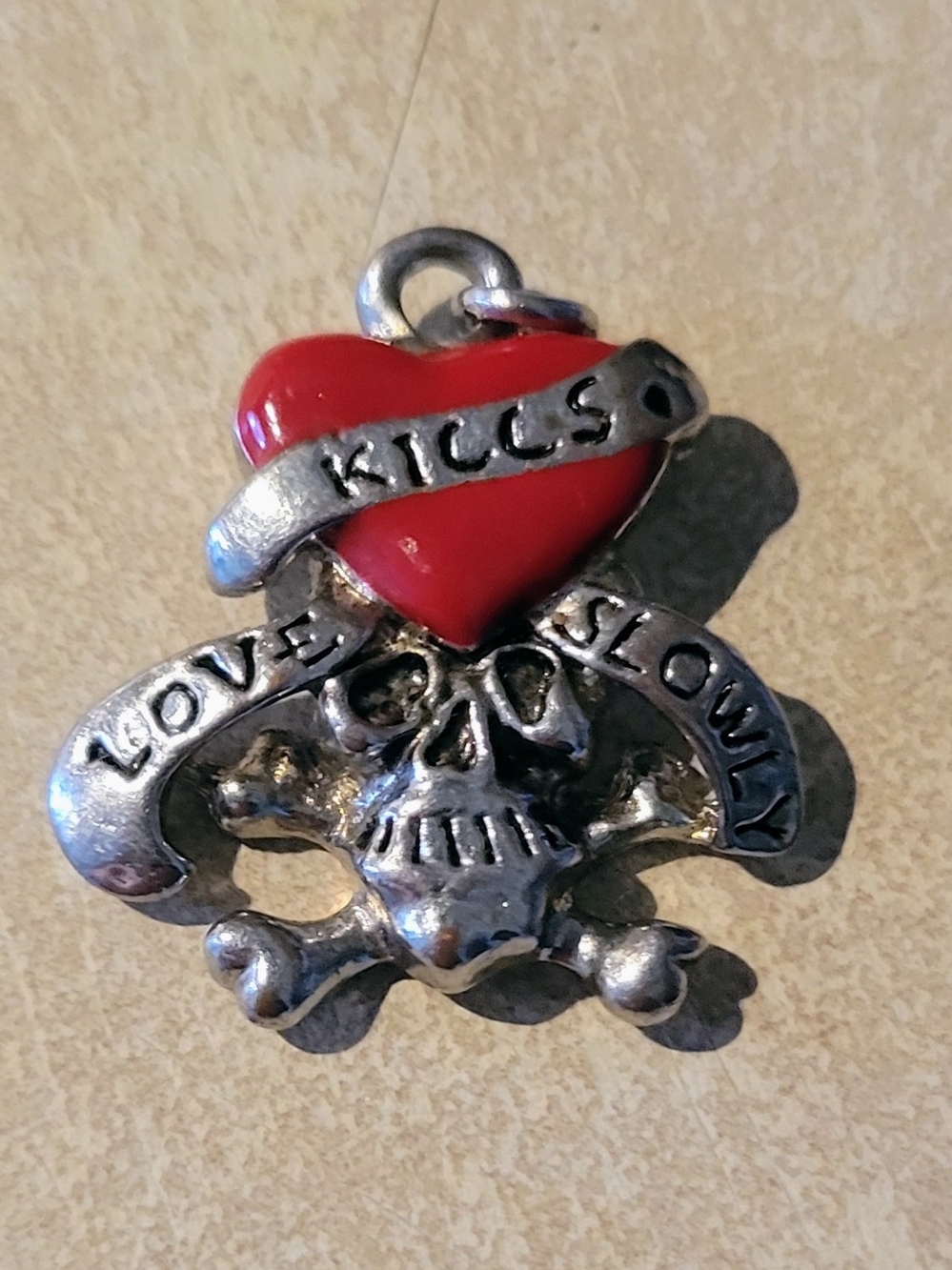NWOT Heart & Skull 'Love Kills Slowly' Red and Silver Pendant.